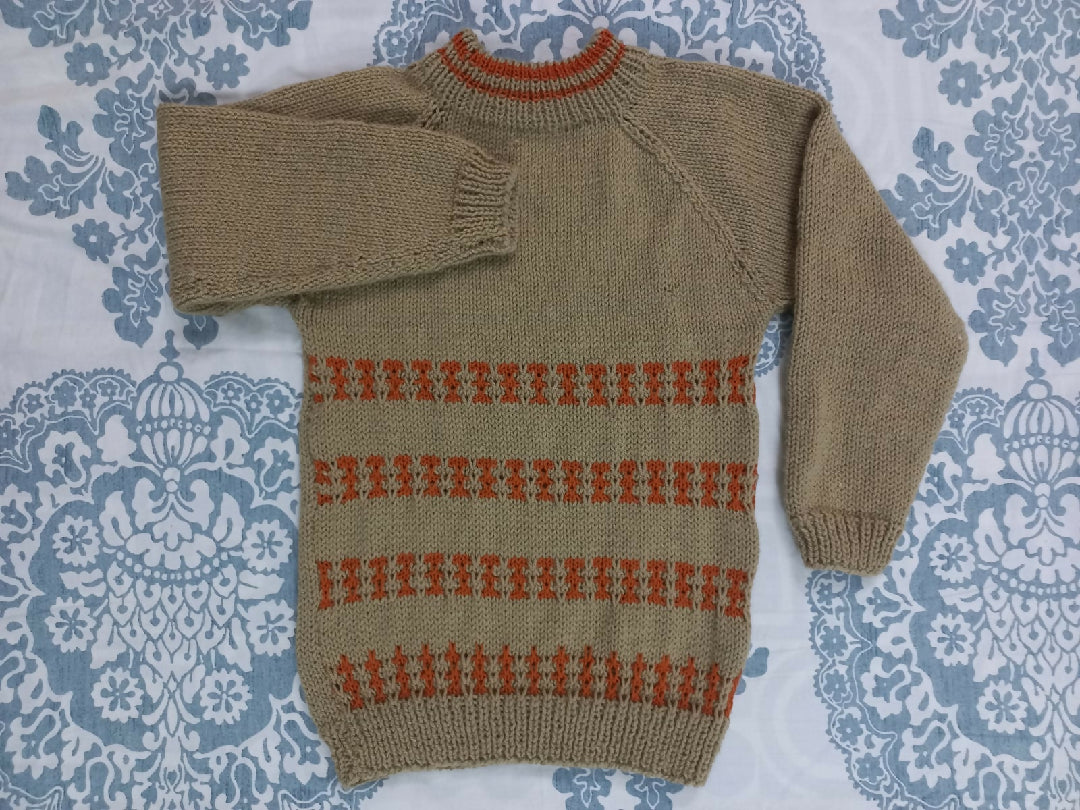 Handknitted Child's Sweater with Patterned Stripes