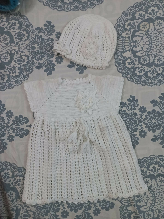 Adorable 2-Year-Old Baby in Crochet Dress & Hat