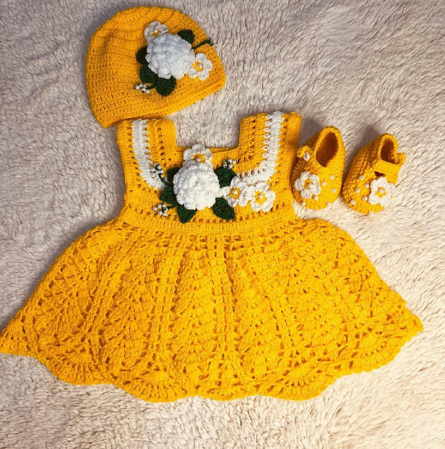 Yellow colored crochet baby girl frock set