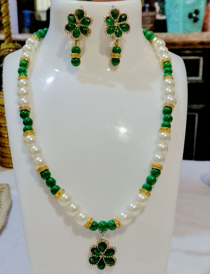 Handmade pearl and green moti nacklace set with stunning charms