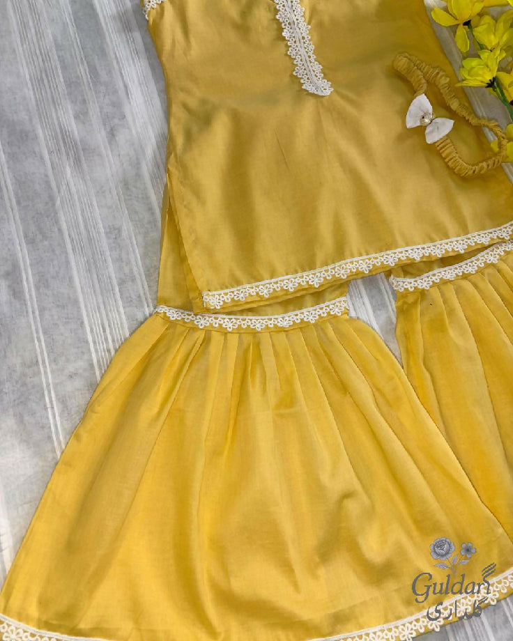 Yellow colored summer lawn shirt gharara and Hairband