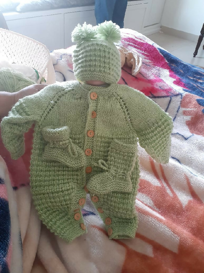 The Cozy Baby in Green A Sweet Knitted Romper Moment 0-3 Months
