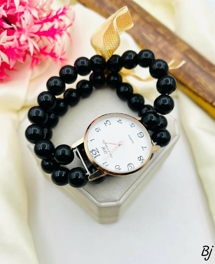Elegant Black Bead Watch with Gold Accents